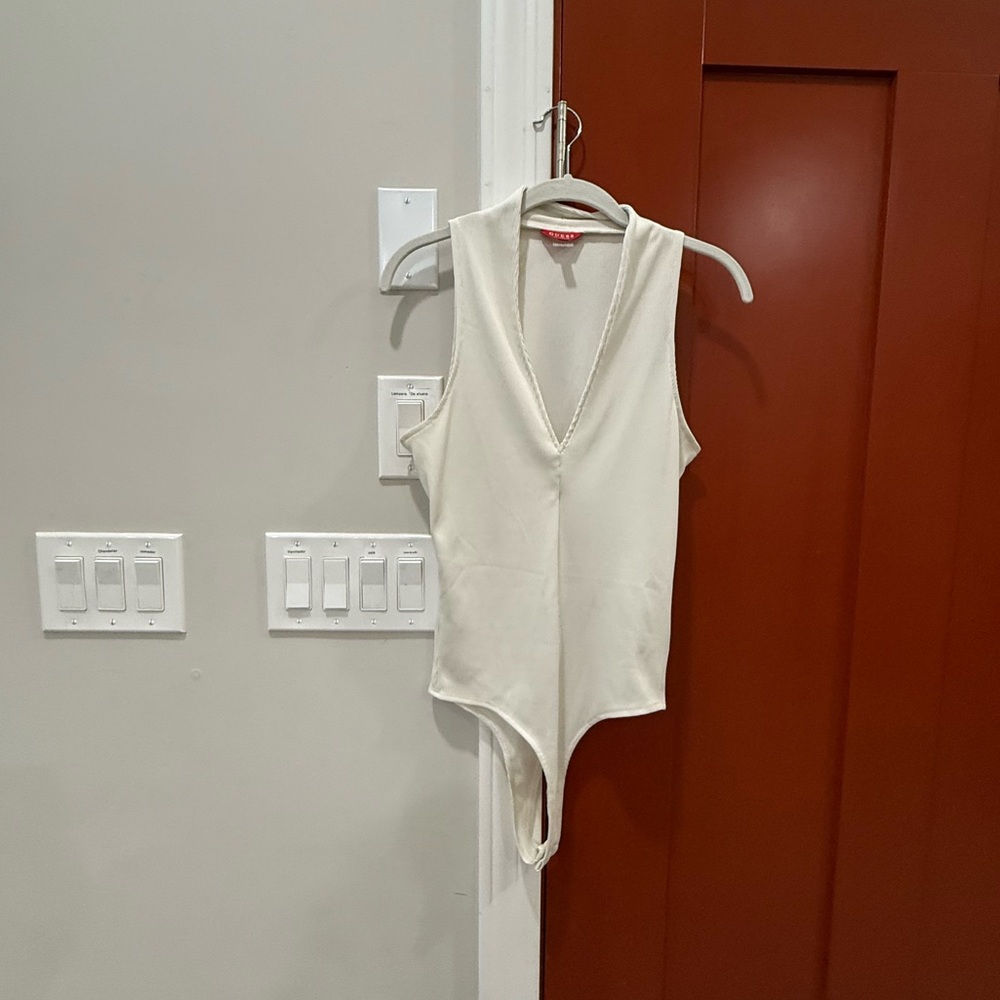 Women’s Guess Cream Sleeveless Bodysuit V-neck line‎